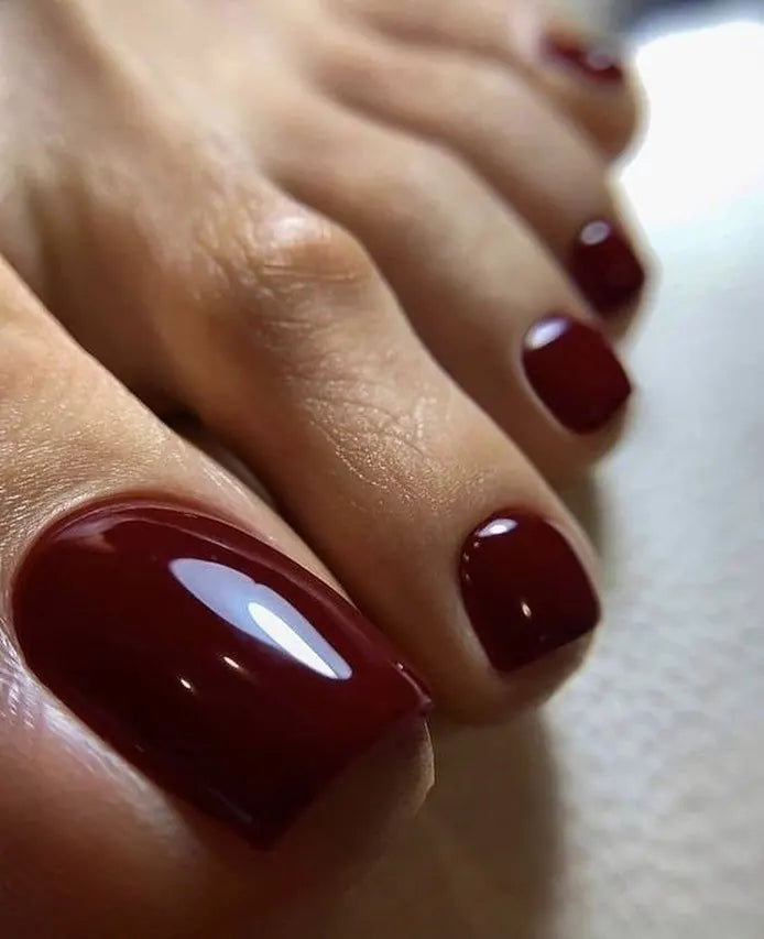 Deep red pedicure